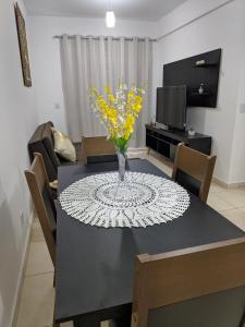 Apto completo com varanda gourmet a 50 mt da praia