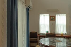 空港まで車で15分ビーチまで徒歩1分海沿いの閒雲斎