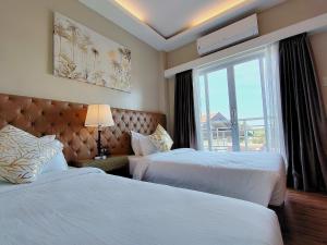 Ambien's Place Residential Hotel - 3hvězdičkové hotely ve městě Dagupan