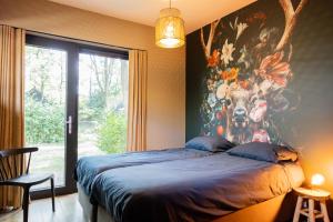 Boshuis midden in het bos met houtkachel in Appelscha