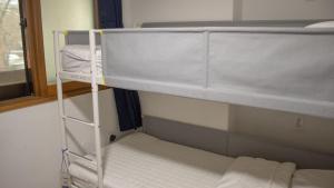 Giường trong Phòng ngủ tập thể Nữ 4 Người (Bed in 4-Bed Female Dormitory Room)