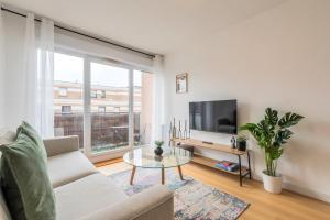 Appartement une chambre avec parking et balcons