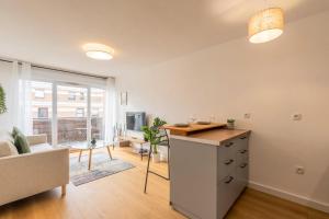 Appartement une chambre avec parking et balcons