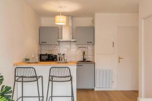 Appartements Appartement une chambre avec parking et balcons : photos des chambres