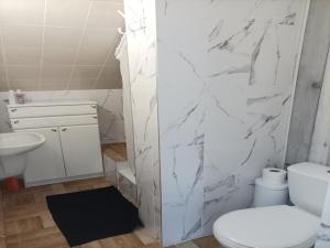 Apartment in Rowy with a garden