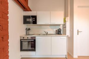 Studio sous les combles côté rue, parking gratuit