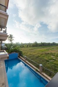 Horizon 1BHK Suite - Pool & Field View Da Alohas