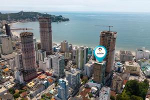 Com garagem e vista mar em Itapema SP8184