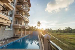 Vista Verde - Luxe 1BHK with Pool & Field Views