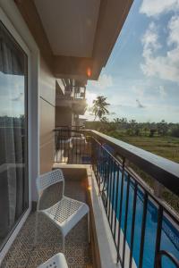 Vista Verde - Luxe 1BHK with Pool & Field Views