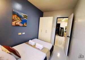 Palawan 2BR Staycation with Swimming Pool, Gym & Parking - B1 5Kunzite