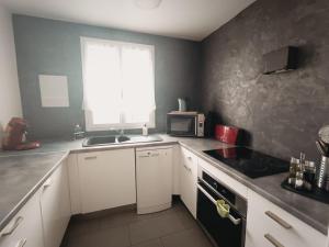 Appartements Duplex proche Disney avec ecran cinema : photos des chambres