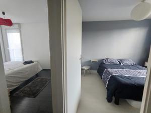 Appartements Duplex proche Disney avec ecran cinema : photos des chambres
