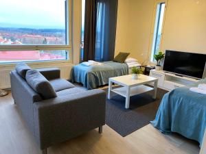 Kotimaailma Apartments - saunallinen kaksio - Härmälä