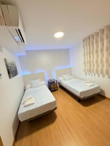 Twin Room with Shared Bathroom room in Hostal Quinta Santillan