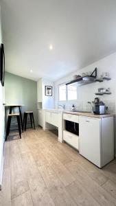 Appartements Studio avec jardin : photos des chambres