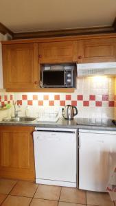Appartements les 7 laux immobilier chalet A : photos des chambres