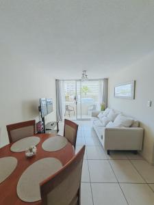 Depto A pasos de la playa-piscina-parking-lavadora-wifi-camas premiun-5pers