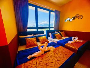 Deluxe Suites with Infinity Pool, Kids Pool & Sea
