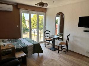 Appartements Studio cosy : photos des chambres