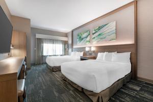 Queen Room with Two Queen Beds and Communication Assitance room in Best Western Plus Grand Rapids MN