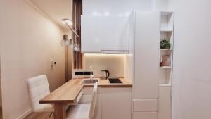 Amber Gloss, Casa Al Mare