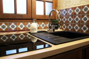 Appartements Moulin a vent restaure et classe meuble de tourisme : photos des chambres