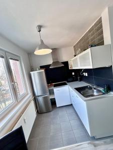 Pokojný a slnečný apartmán blízko centra 24h self check-in