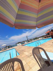 TOP 1 QUARTO com ESTACIONAMENTO em Condomínio com VISTA INCRIVEL - PORTARIA 24h, PISCINA, Sauna e Parquinho Infantil - Apartamento com Ar condicionado, Smart TV, Wi-Fi, Cozinha Completa, NETFLIX, Entre o MAR e a LAGOA, CUSTO BENEFICIO