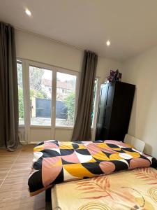 Appartements Charmant T2 proche gare SNCF a 15 min de Lyon : photos des chambres