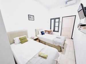 Urbanview Roemah Tanjung Blitar