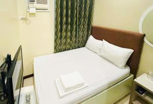 Marianne Suites Hotel by RedDoorz