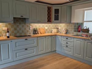 Unwind at Hilltop Farm Cottage with Valley Views