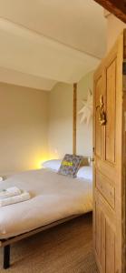 Maisons de vacances La Maison Chez Lisette avec piscine et terrain de petanque prive au bord de l-Allier ! : photos des chambres