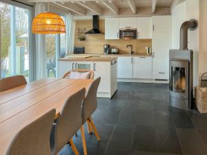 Ferienhaus - Ferienhaus Wiesengeflüster E2 - nur 3 Gehminuten zur Müritz und mit Sauna