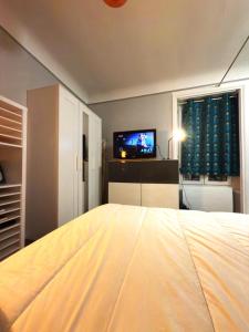 Appartements taverny 2 pieces , 2 lits de 2 places : photos des chambres