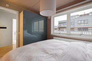 DINBNB APARTMENTS l Unbeatable Location l Priv Rooftop l Self Check-in