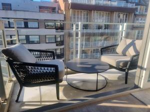 Bright apartment with sunny terrace and parking