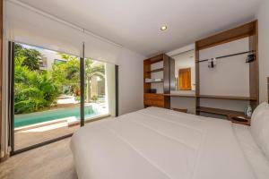 2 BR with Direct Walk-out to Pool, Sauna, and Gym