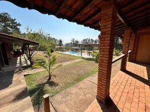 Chalé Madeira Proximo ao thermas Churrasqueira, Ar e Piscina