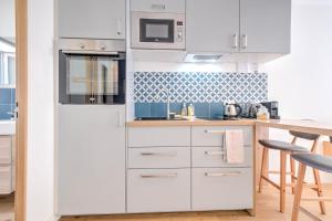 Appartements Apparts Limogeanne - Clim - Centre historique : photos des chambres