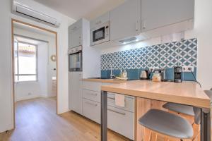 Appartements Apparts Limogeanne - Clim - Centre historique : photos des chambres