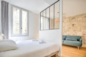Appartements Apparts Limogeanne - Clim - Centre historique : photos des chambres