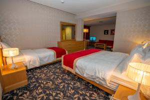 Deluxe Family Room room in Hotel Colosseo & Spa