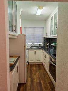 Apartamento Oura com piscina e vista mar