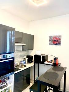 Appartements Bel appartement face a la gare : photos des chambres