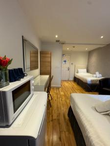 Standard Triple Room room in The Paramount Hotel