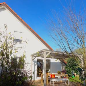 Appartements Appartement-maison avec jardin : photos des chambres