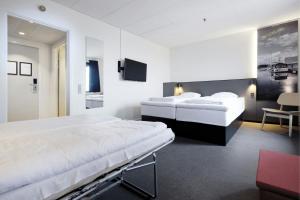 Larger Family Room with King and Sofa Bed - City View room in Zleep Hotel Ishøj