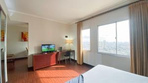 1BR Queen Bed at Marina Ancol Apartment near Dufan By Travelio
